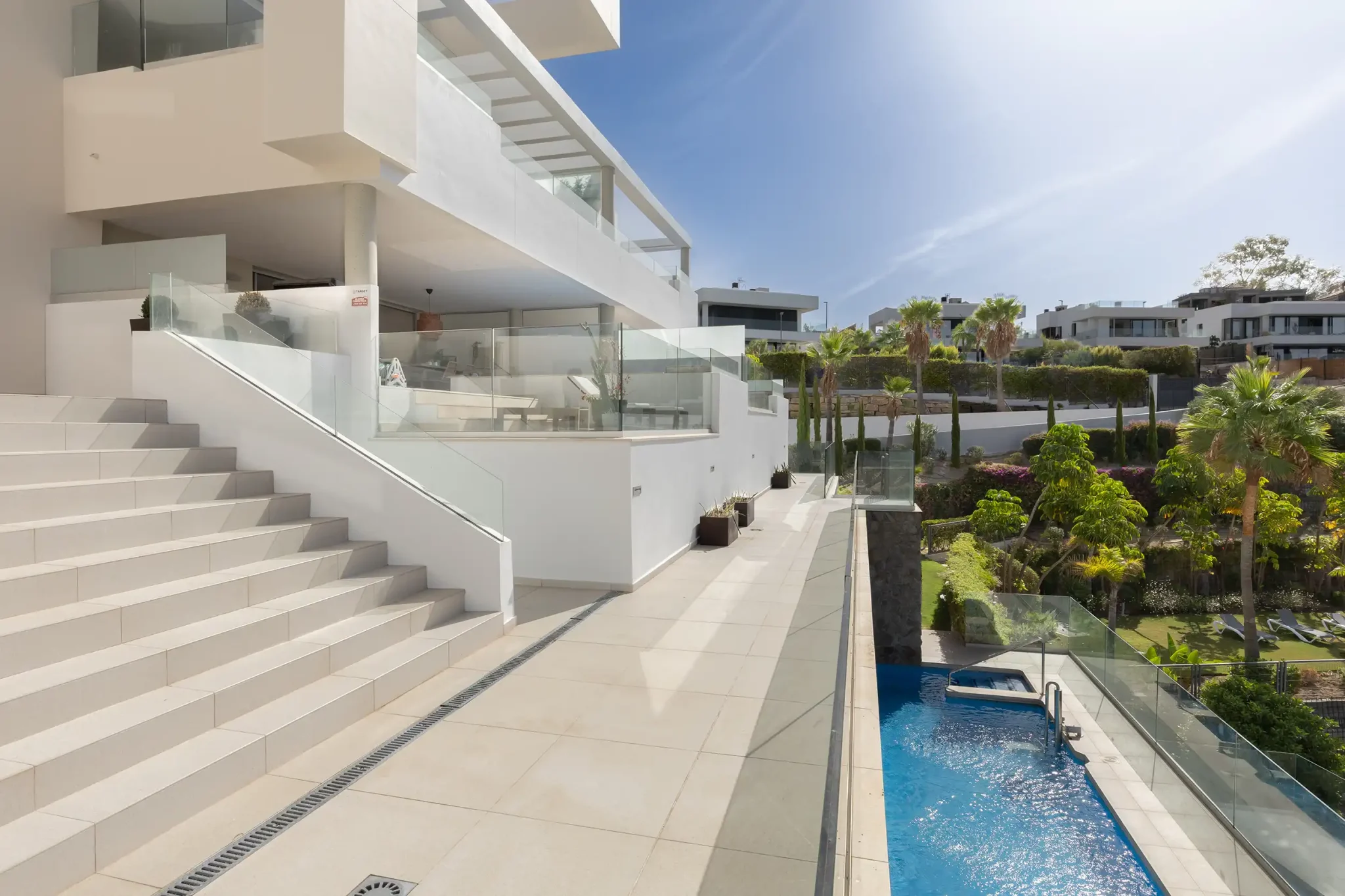 General views of La Morelia de Marbella, showcasing the swimming pools, gardens and terraces.