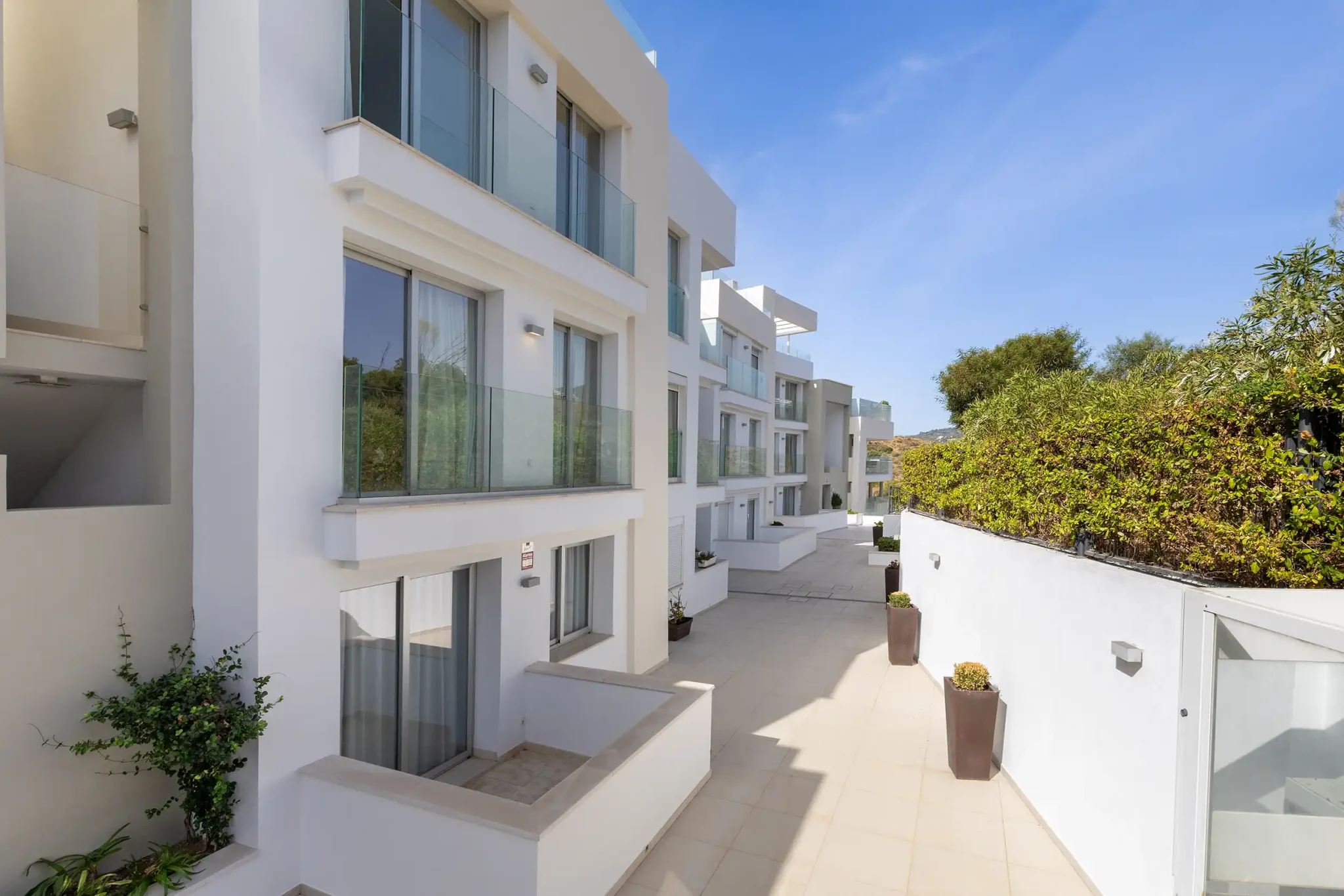 General rear view of the apartments, with access to the lifts and stairways connecting the different areas of the development.
